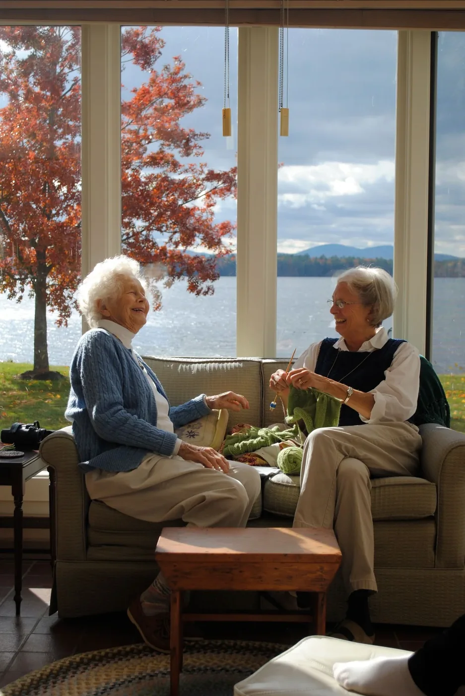 Two older people enjoying a relaxed conversation